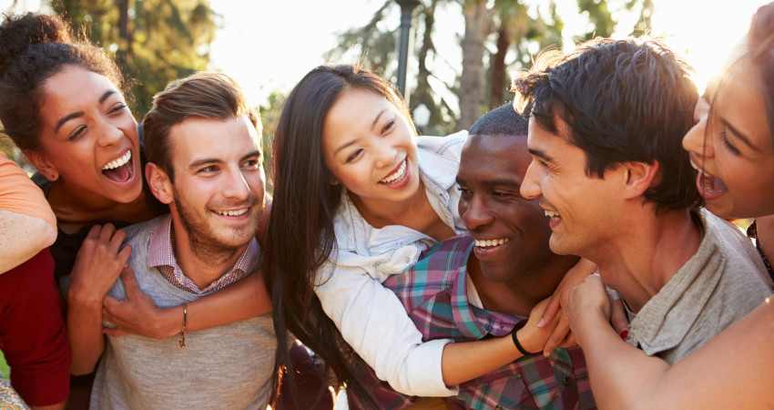 Group Of Friends Having Fun Together Outdoors